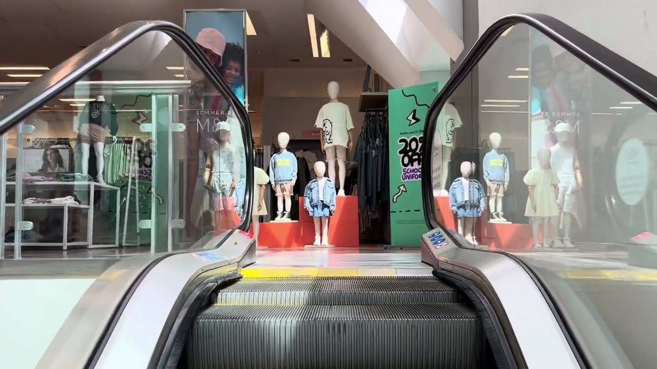 Harrogate, England. 4x O&K Escalator ride at Marks and Spencer Department store in Town Centre
