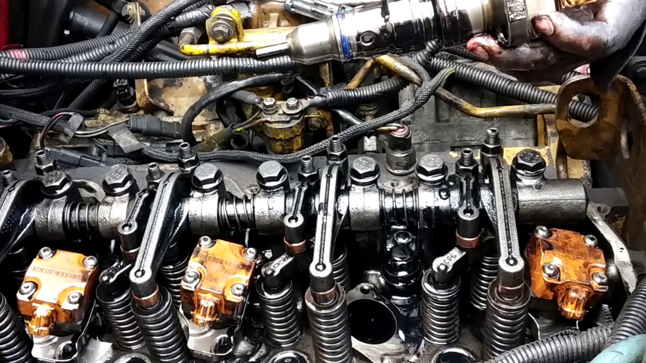 CAMBIO CAPUCHONES CATERPILLAR 3126