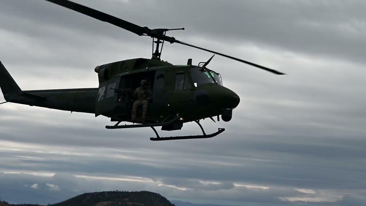UH-1 Huey Gunship 2026 Flying Low Door Gunners Ready for Action US Military 