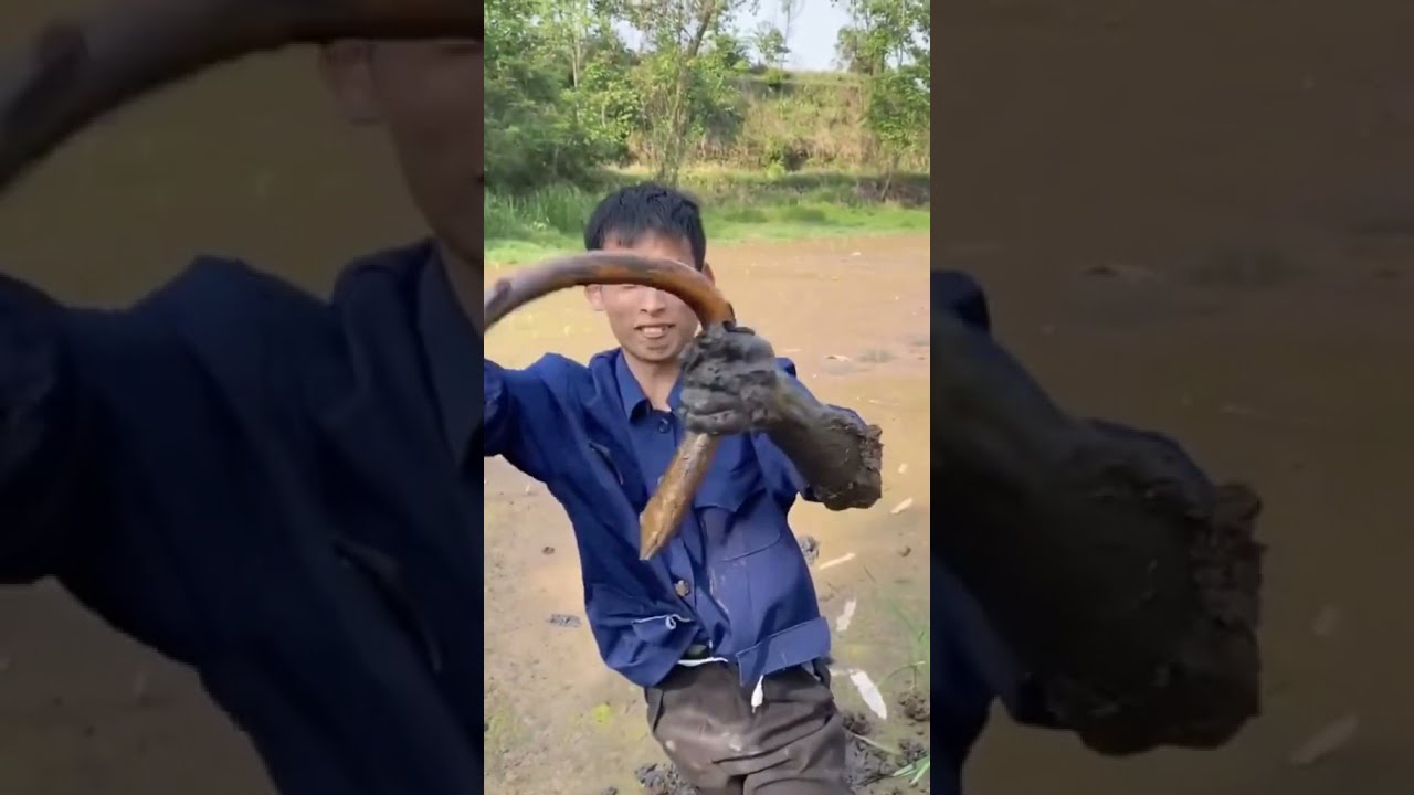 nelayan cina menangkap belut. besar juga.