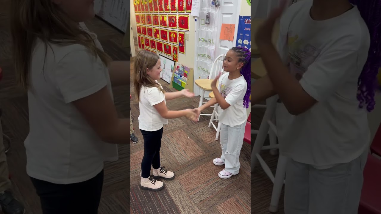 Scarlett and her friends doing this lemonade handshake! #lemonade #handshake #handclap #friends