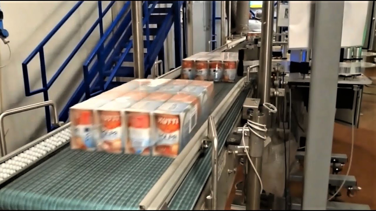 Групповая упаковка пачек в термоусадочную плёнку. Упаковщик Prasmatic TC 400