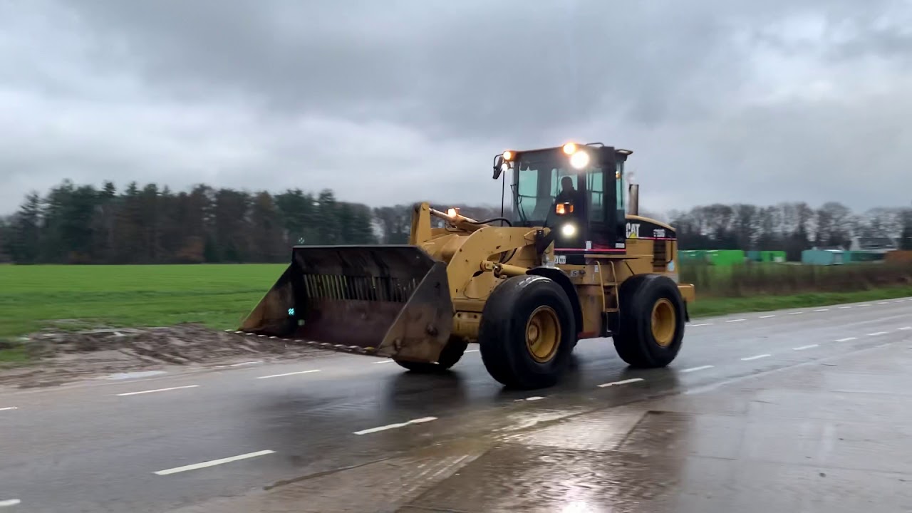 Testing wheelloader: Caterpillar 928G, year 2000 - dutch machine - top condition