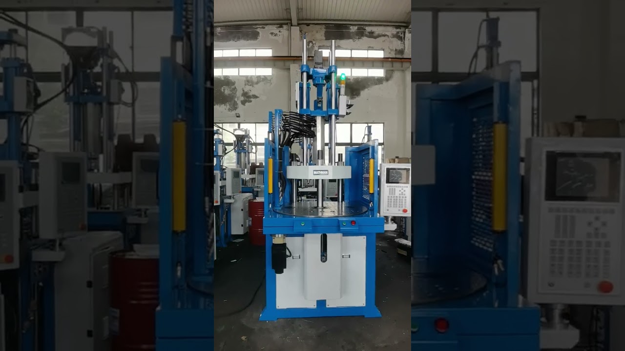 Rotary table vertical injection molding machine