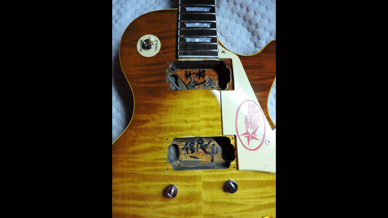 My first Chibson...love at upgrading. A fake Gibson Les Paul story.