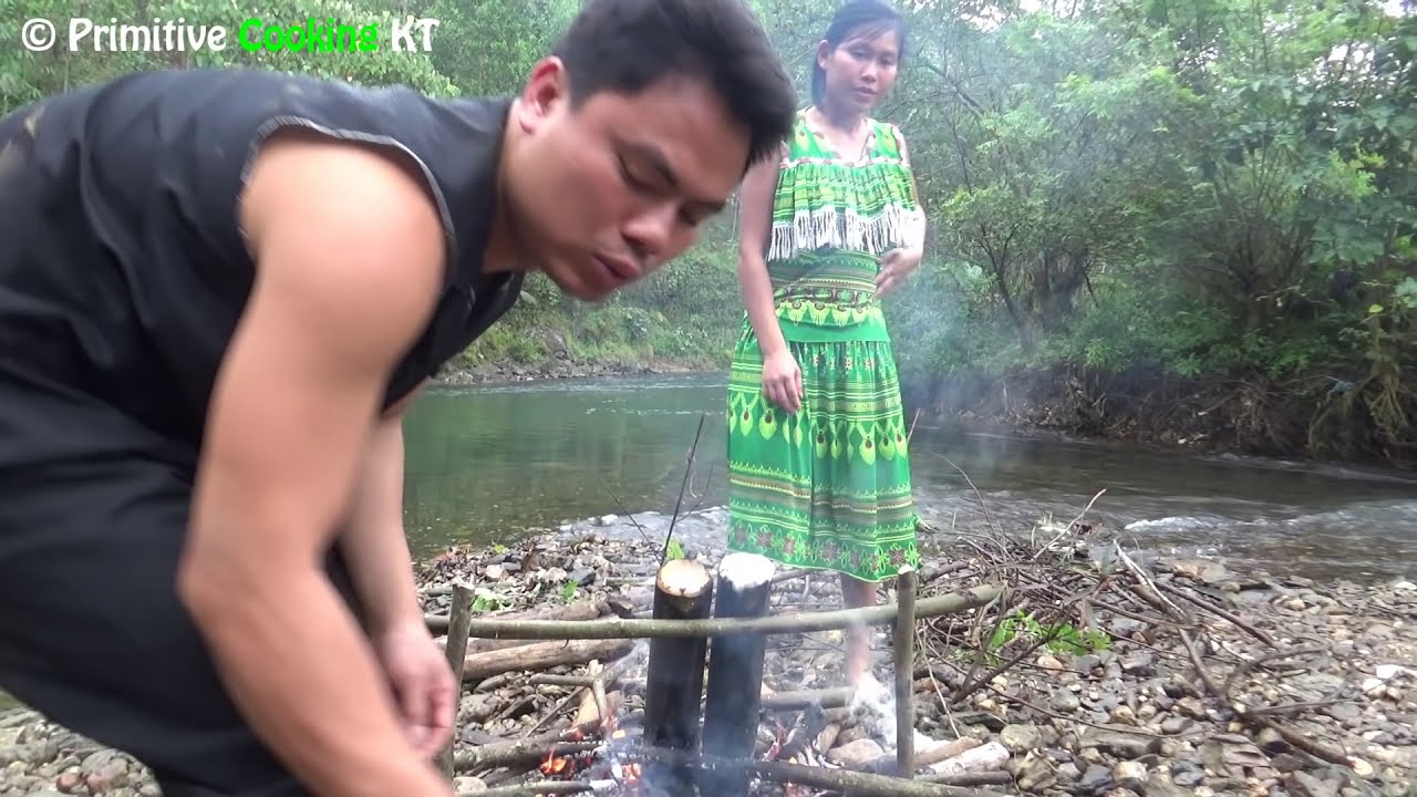 Primitive technology - Survival skills finding natural food and cooking in bamboo - Eating delicious