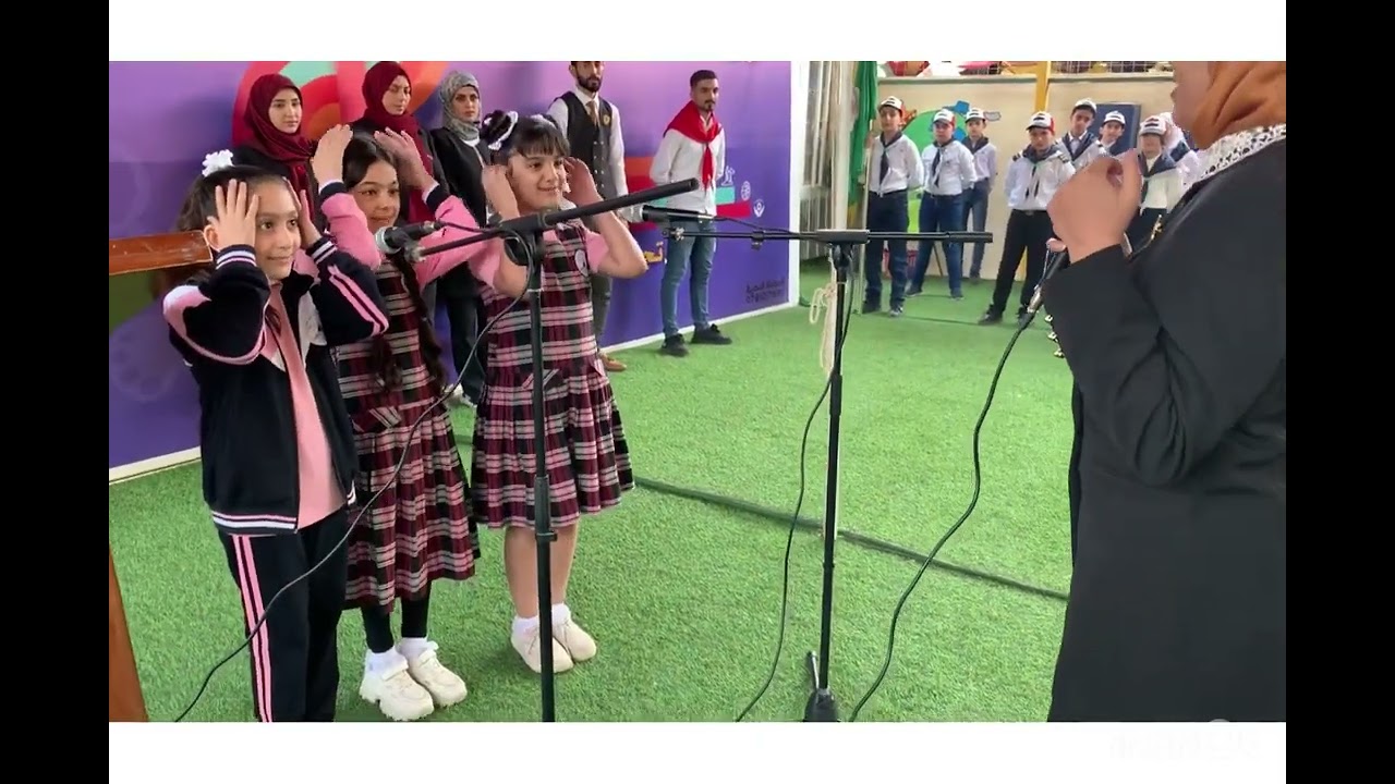 مراسيم رفع العلم العراقي في مدرسة الزهراء الاهلية المختلطة في بابل
