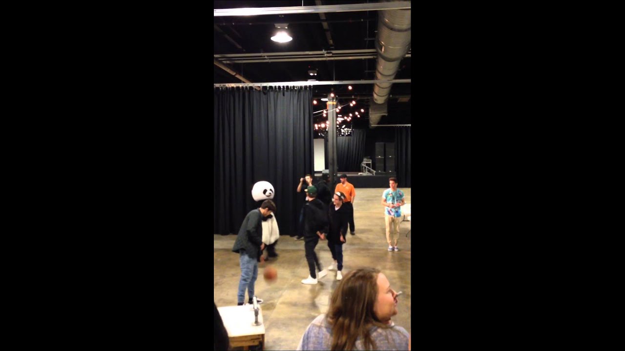 Nate Maloley, Sammy Wilk, and Kenny Holland playing basketball