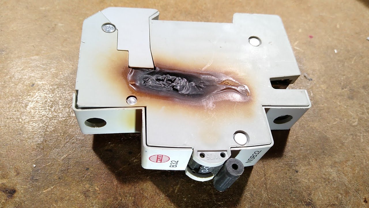 Inside a totally smoked circuit breaker.  What went wrong?