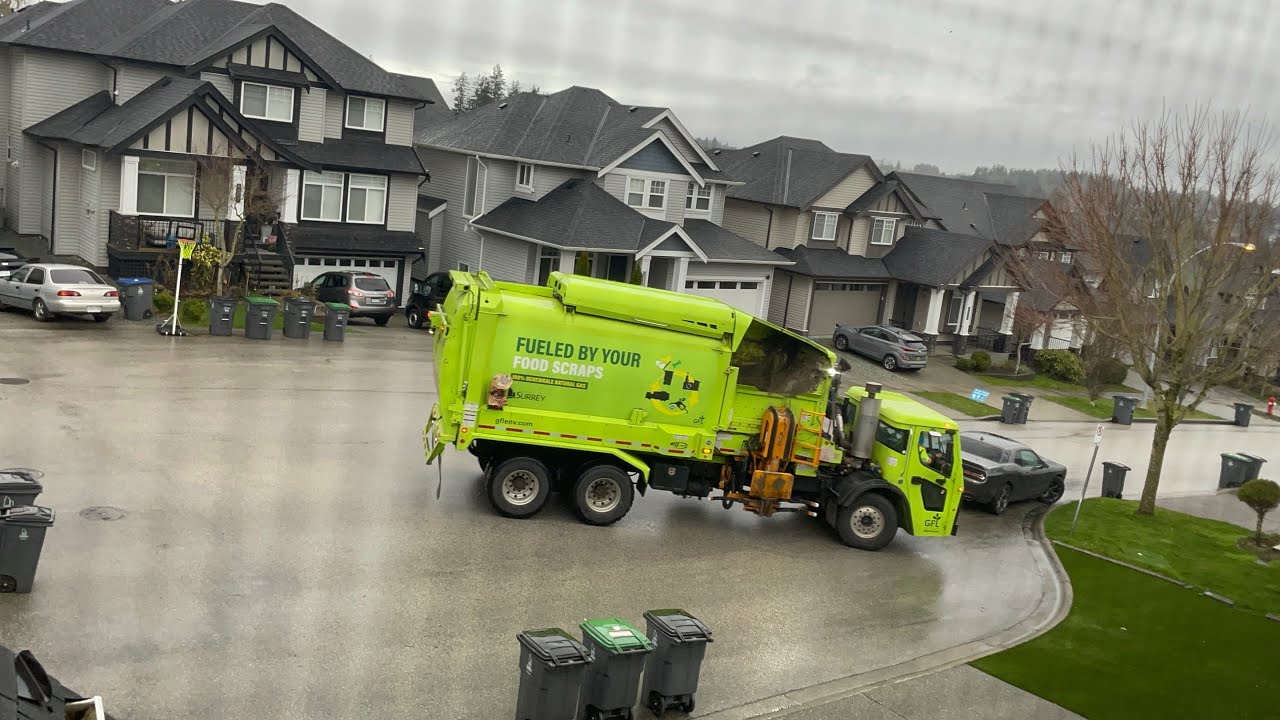 GFL 833112 Mack LR Labrie automizer on yard waste 
