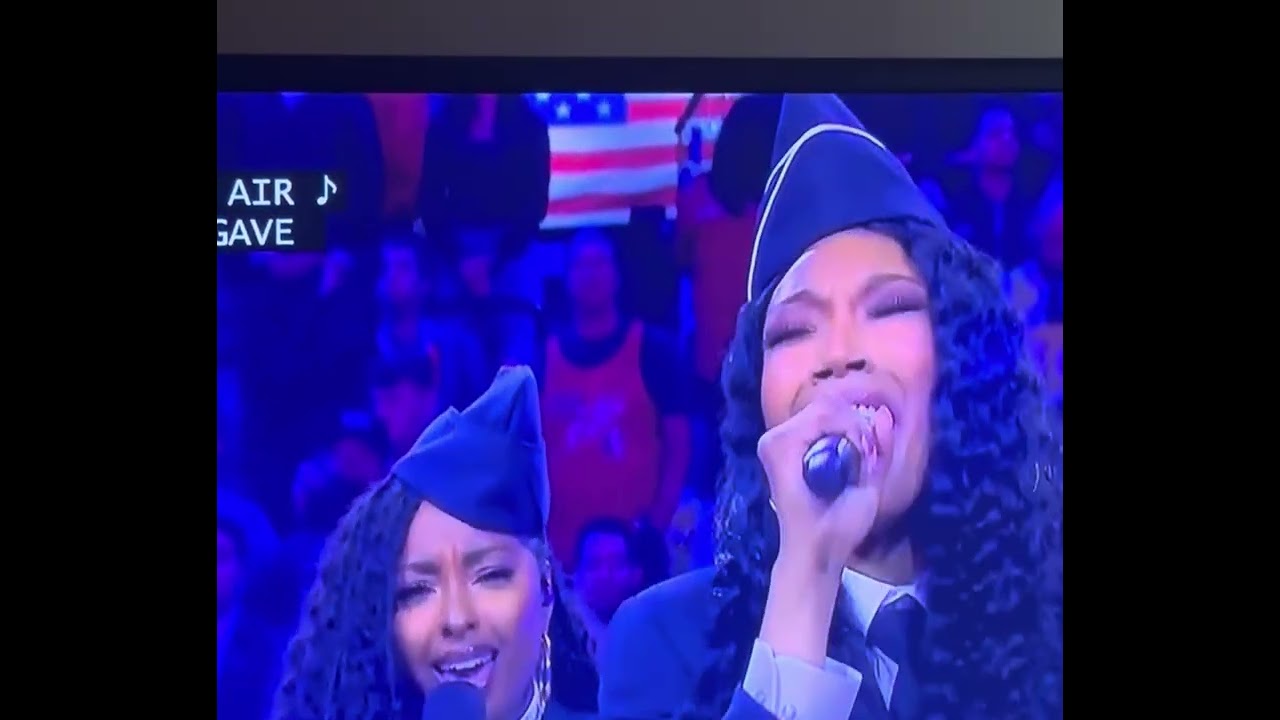 Brandy Ladies and Gentlemen singing the National Anthem 