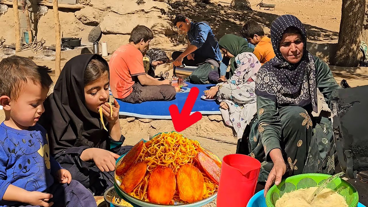 Akram serving delicious spaghetti to her children