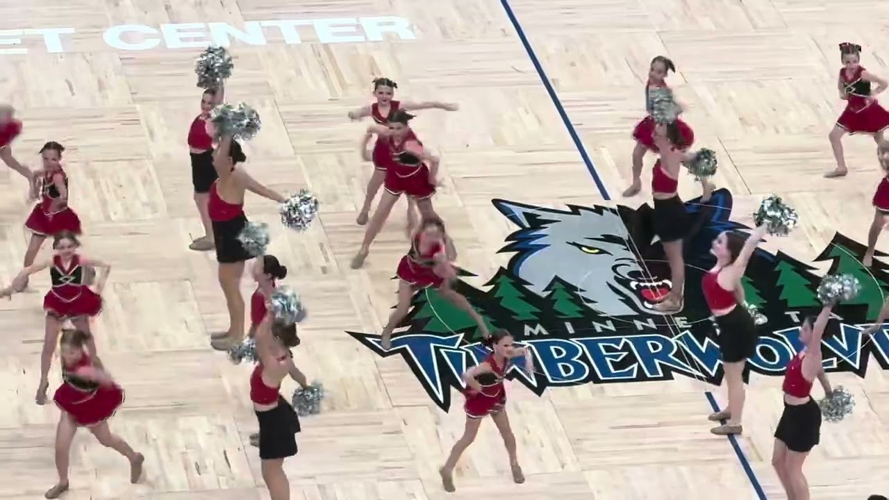 Vivi and Pippa dance at Timber Wolves game