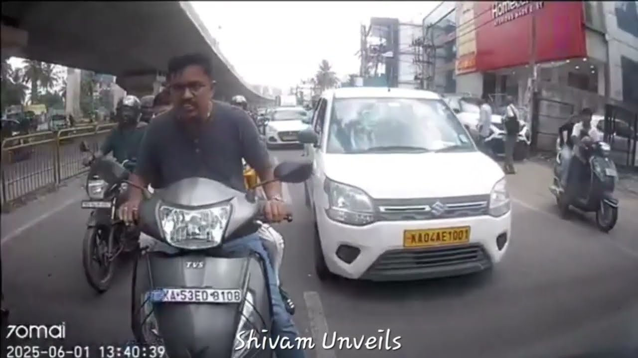 Biker Crashes into Car Near Mall of Asia, Then Blames Driver!