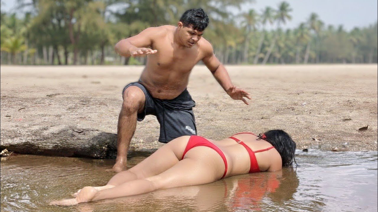 Ele encontra uma mulher desmaiada na água