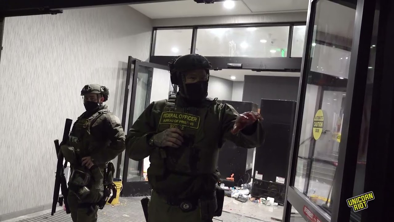 Federal Agents Crash Noise Demo at Hotel, Escort Masked Guests With Luggage Out