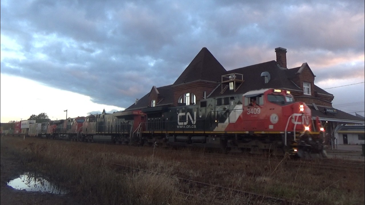 AC44C6M 3409 Leads a Long Stack Train CN 120 w/Inspection Car & DPU thru Amherst, NS