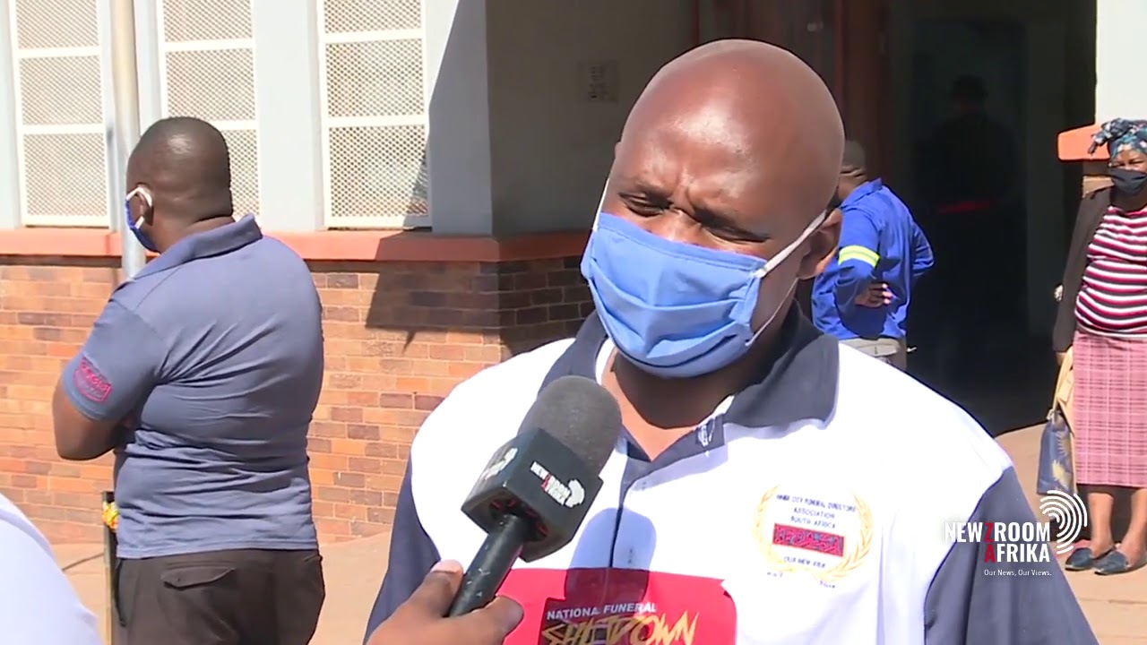 Linda Mnisi is outside the Johannesburg mortuary speaks to funeral palour owners who are on strike