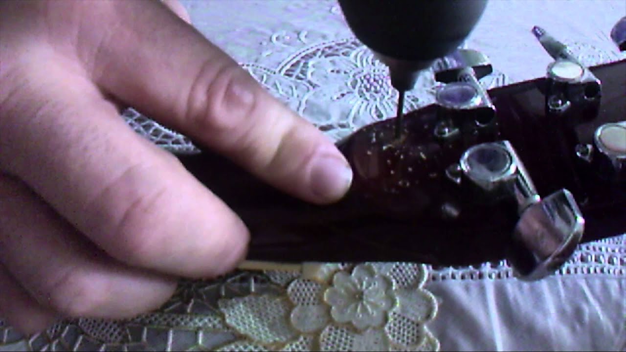 reparación mastil guitarra acustica