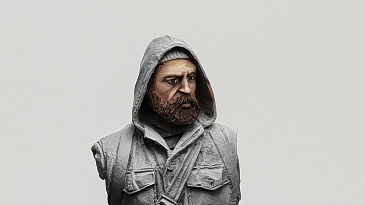 Painting a face in 1/35 with Vallejo acrylics.