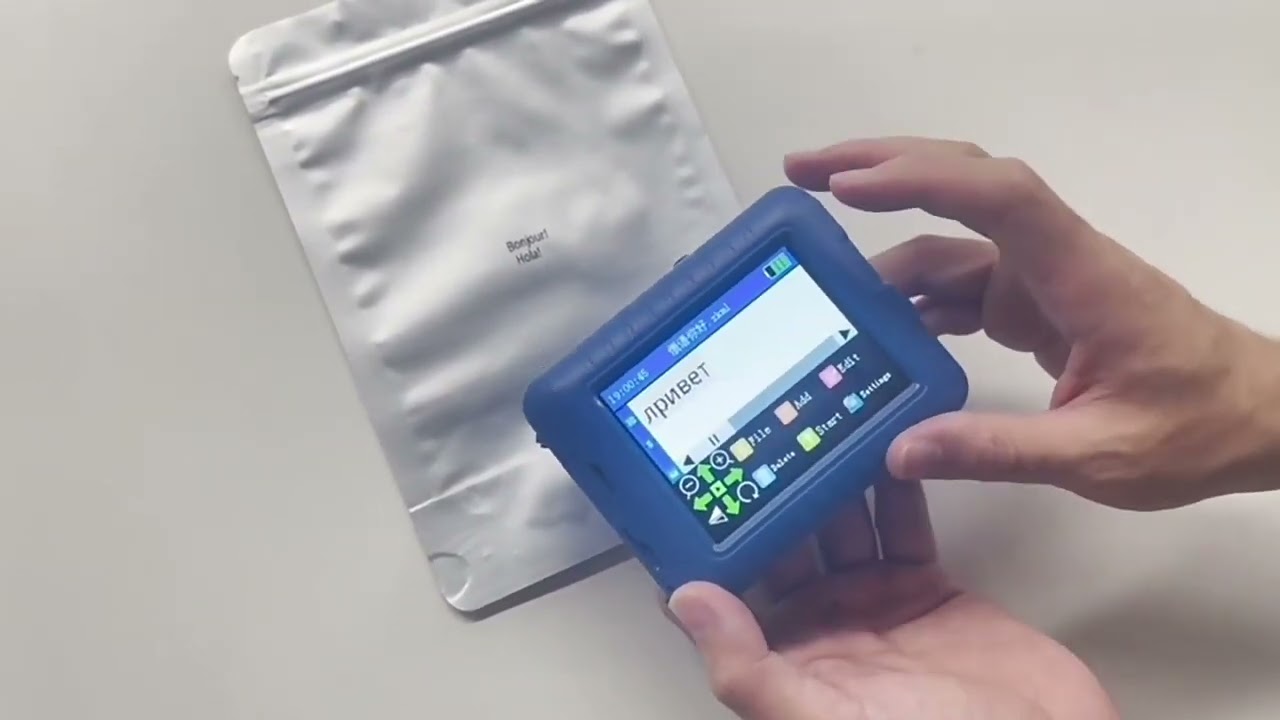 Handheld mini inkjet printer for printing on any surface.