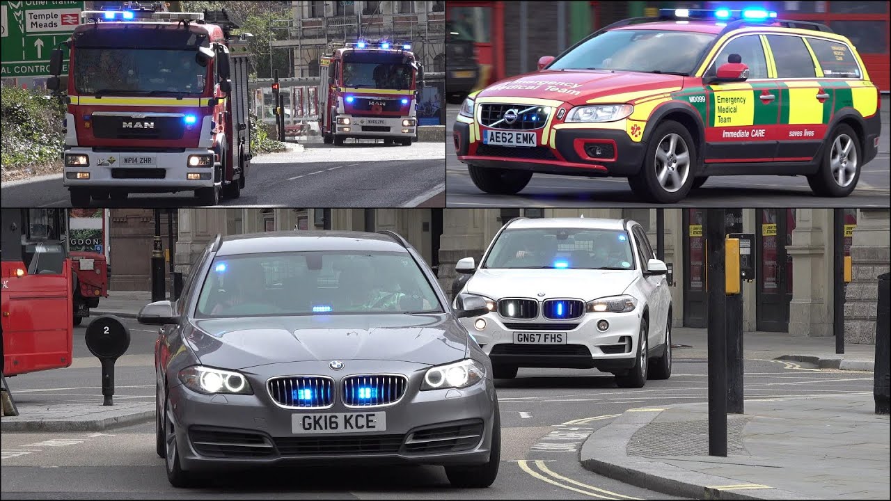 Police Cars, Fire Trucks and Ambulances responding with siren and lights