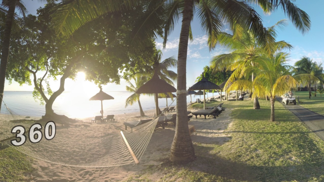 360 VR Sunset scene of tropical resort on ocean coast, Mauritius