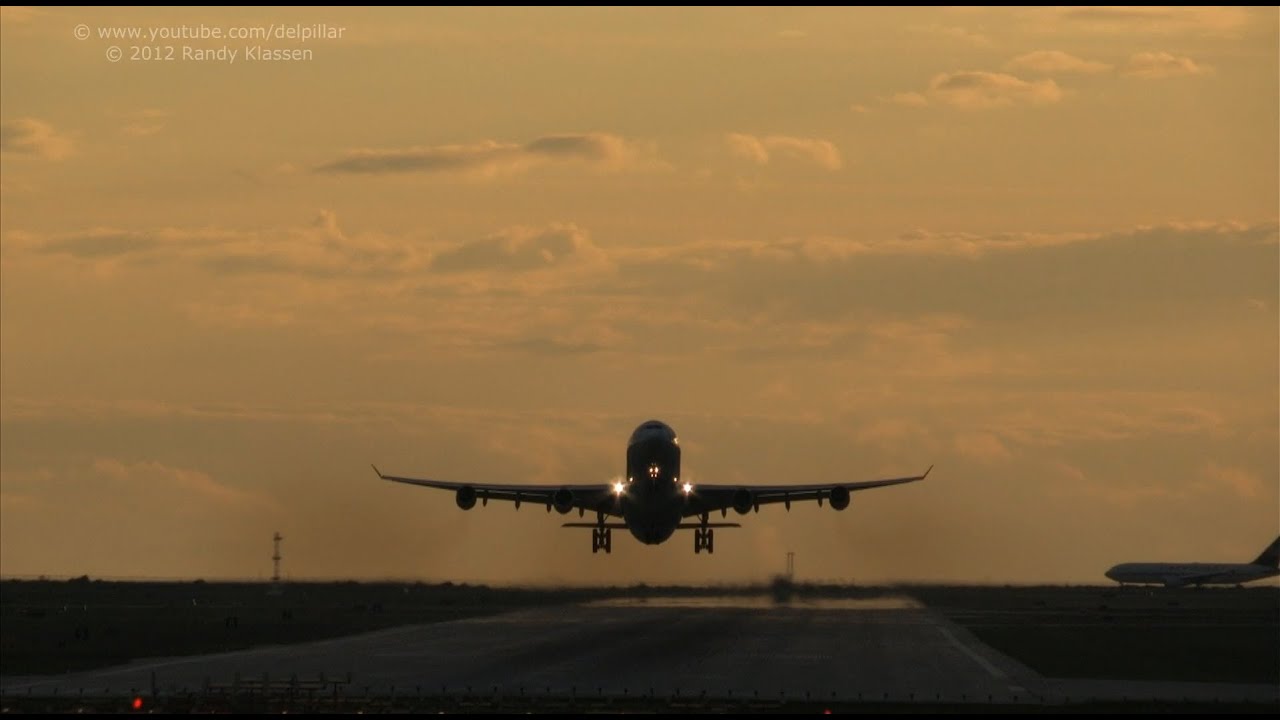 Sunset takeoff's Virgin A340 and British Airways B747 at YVR