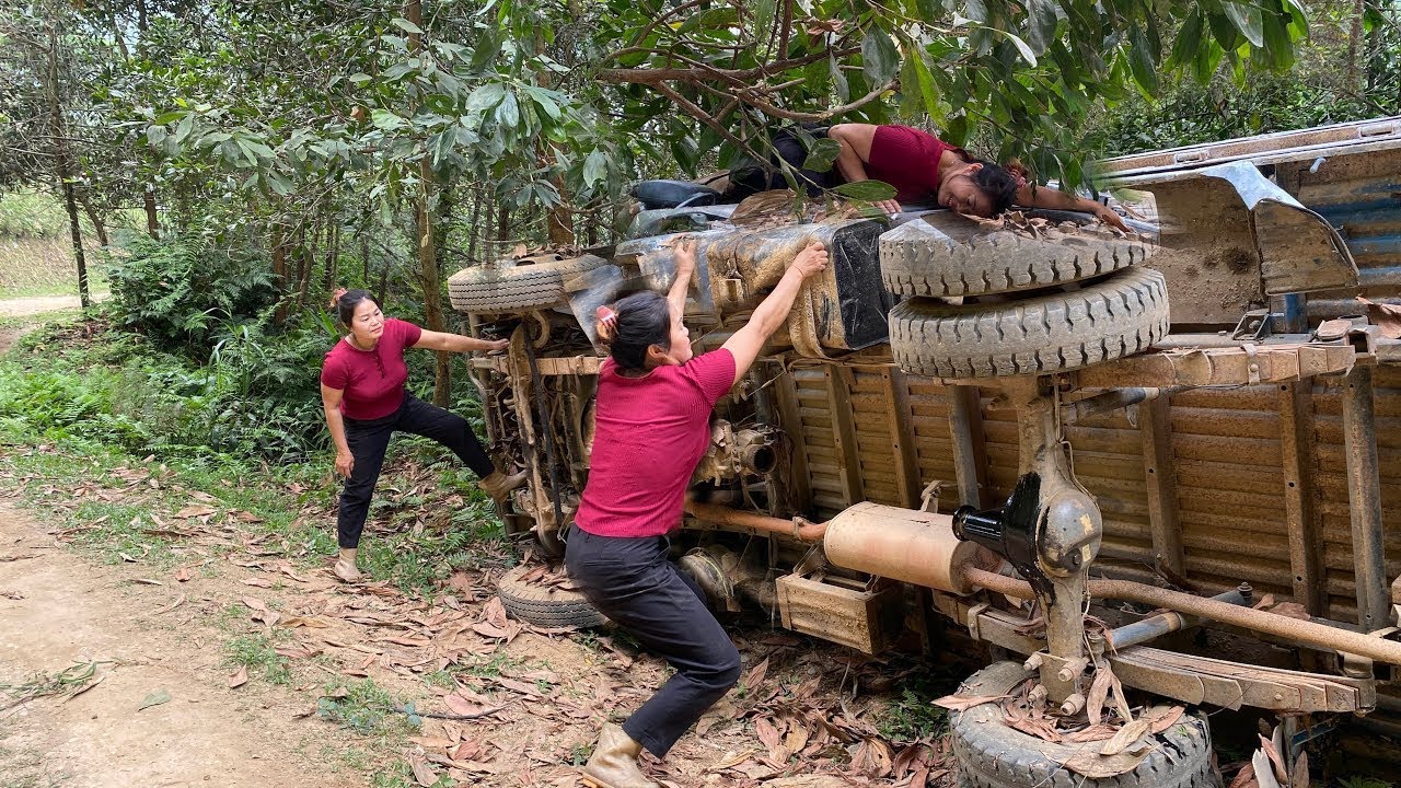 Time-lapse video: Girl challenged to repair and restore an overturned and abandoned car.