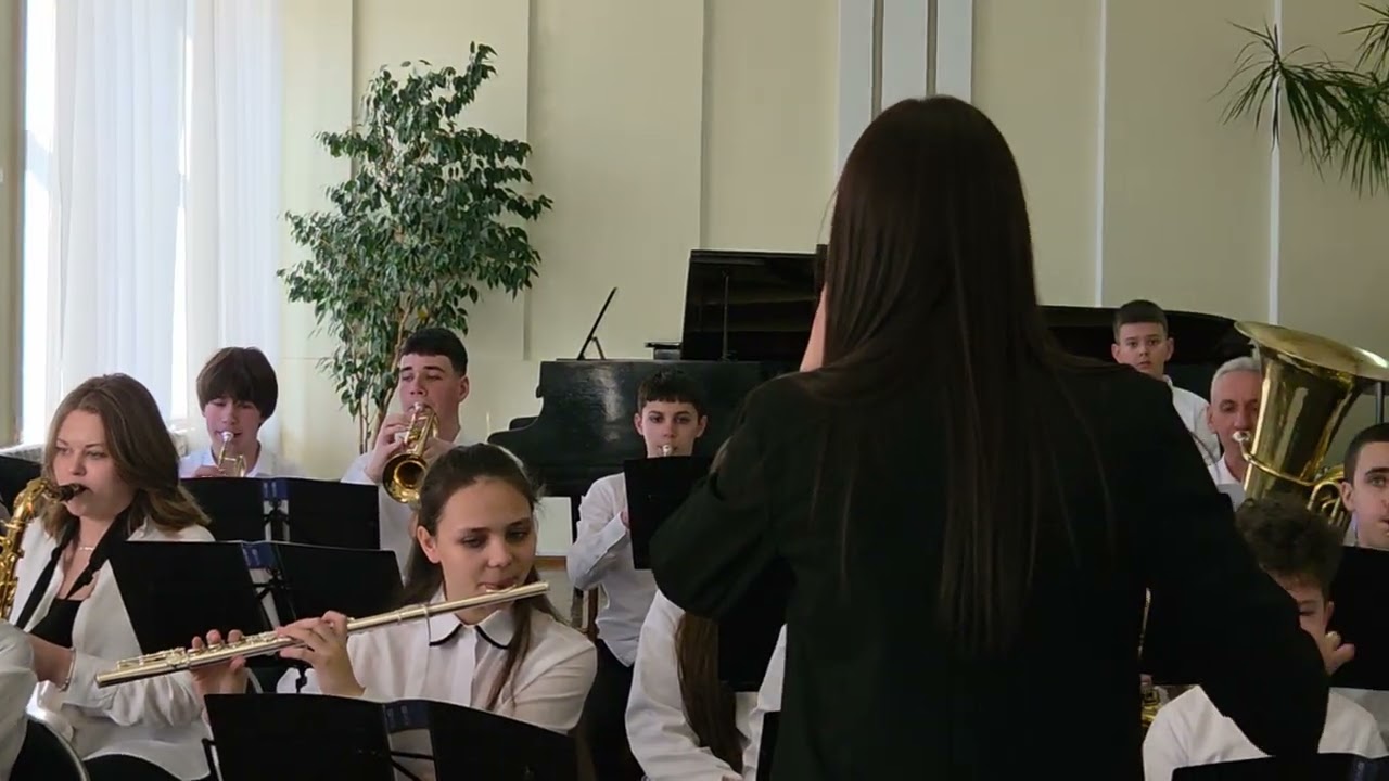 Тед Хаґенс “Ананасовий концерт” Іч.  дитячий духовий оркестр, соло  Р. Бабущак, керівник Л. Вівчарик