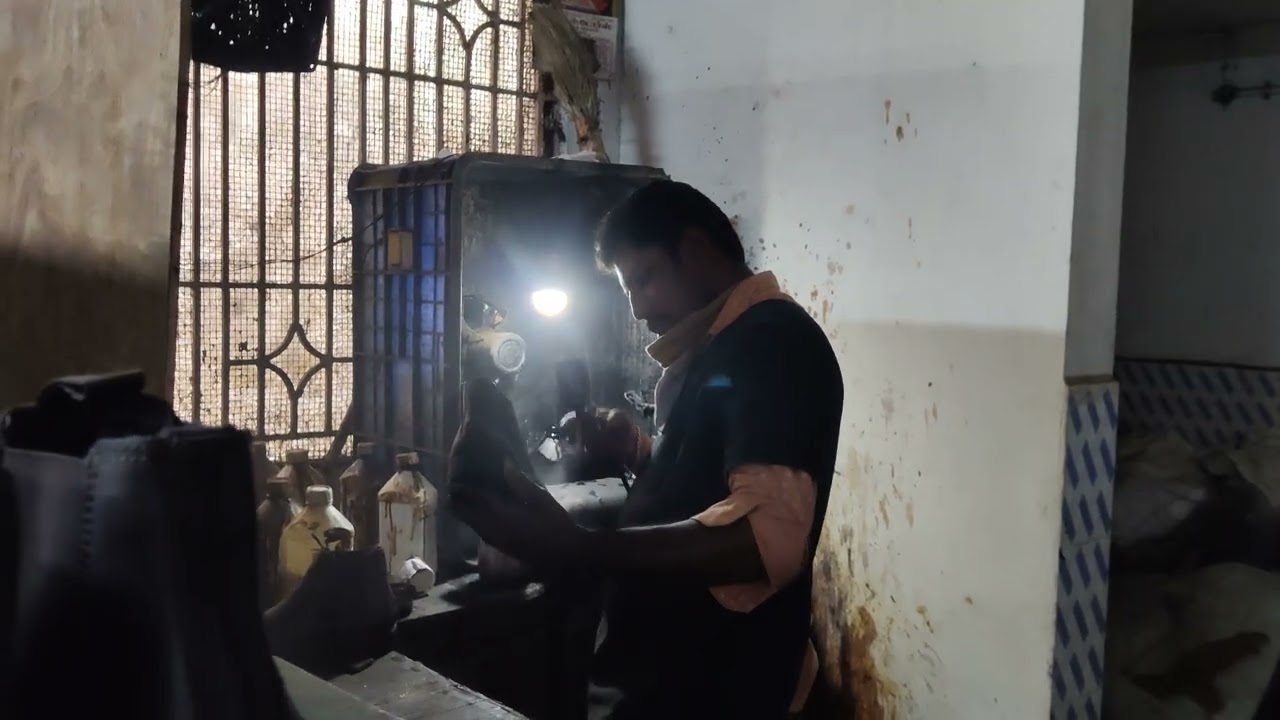 LEATHER SHOES MAKING PROCESS.AMBUR TAMIL NADU. INDIA.