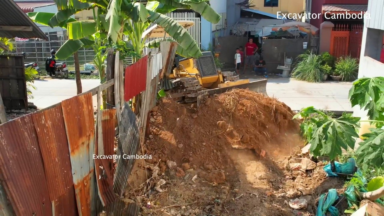 Processing Full Filling Land 10 x  35 M By Small Size Truck Unloading And Bulldozer Moving To Narrow