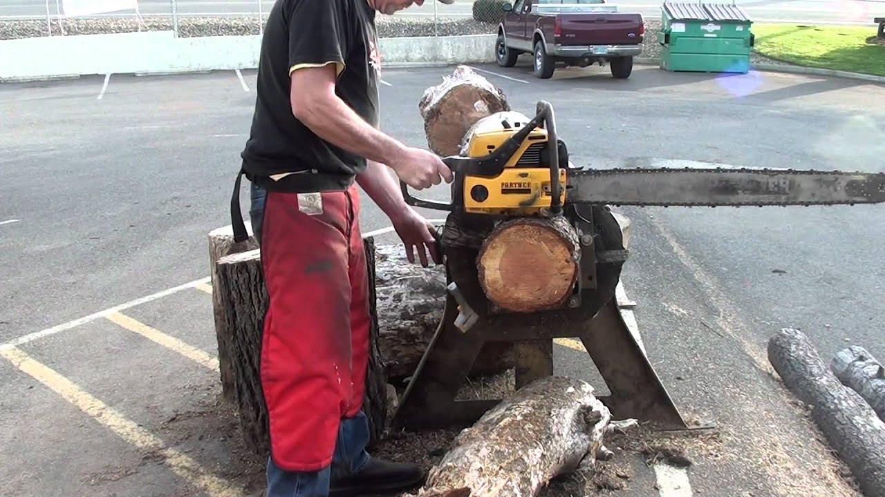 The chainsaw guy log testing Partner P 100 chainsaw 5 3