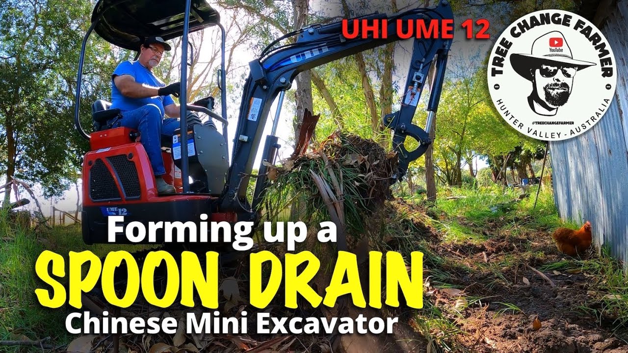 Chinese Mini Excavator  UHI UME 12 - Forming up a SPOON DRAIN #miniexcavator  #farmdiy #uhi