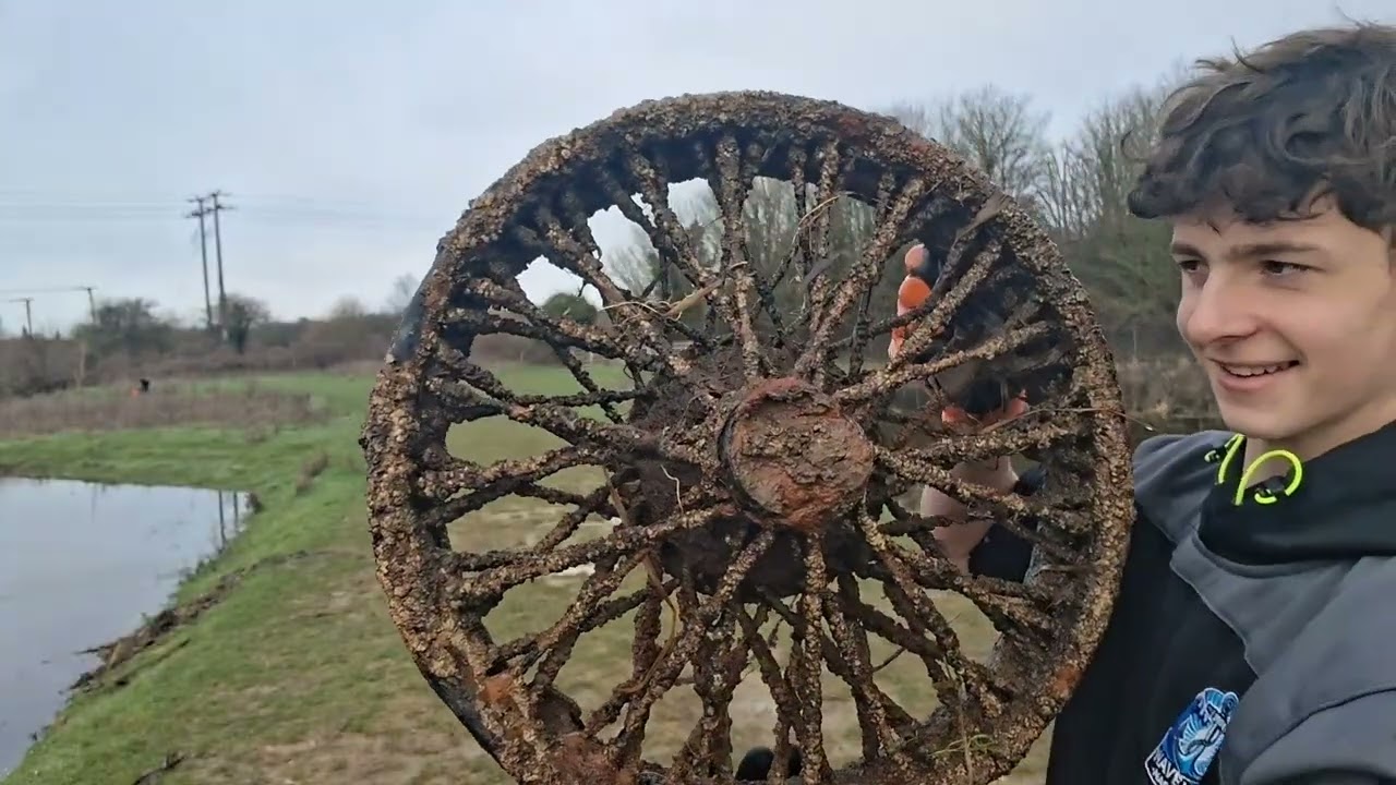 Magnet fishing a flooded river. 