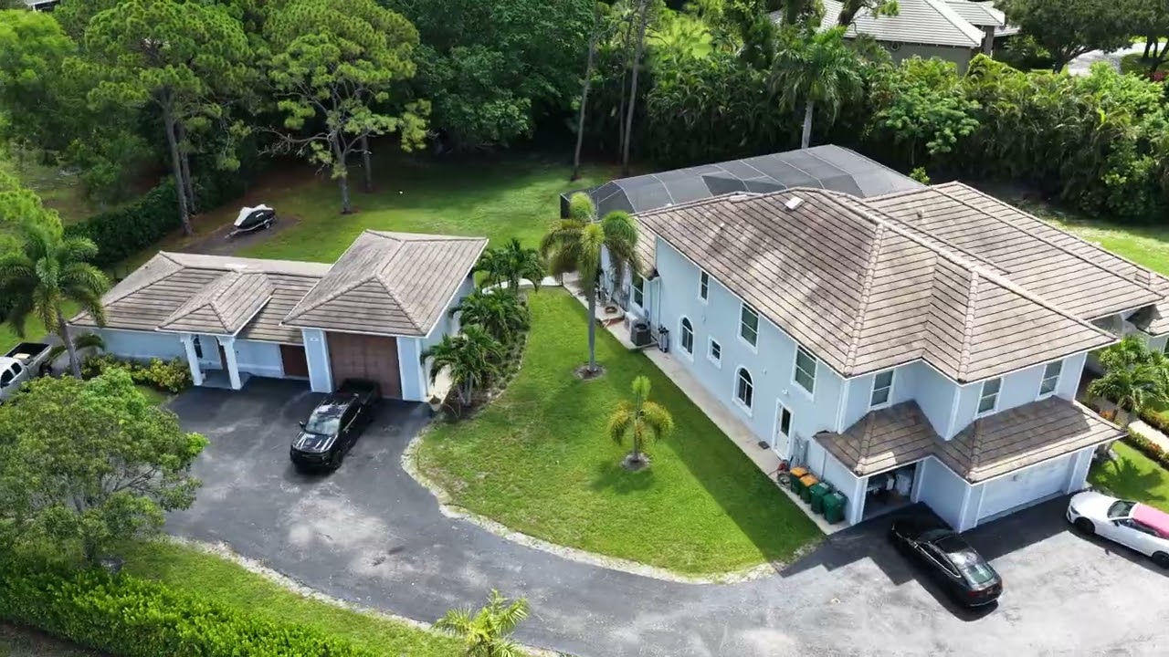 Naples Drone flies investment property of two homes on site for private investor off  Tamiami Trail