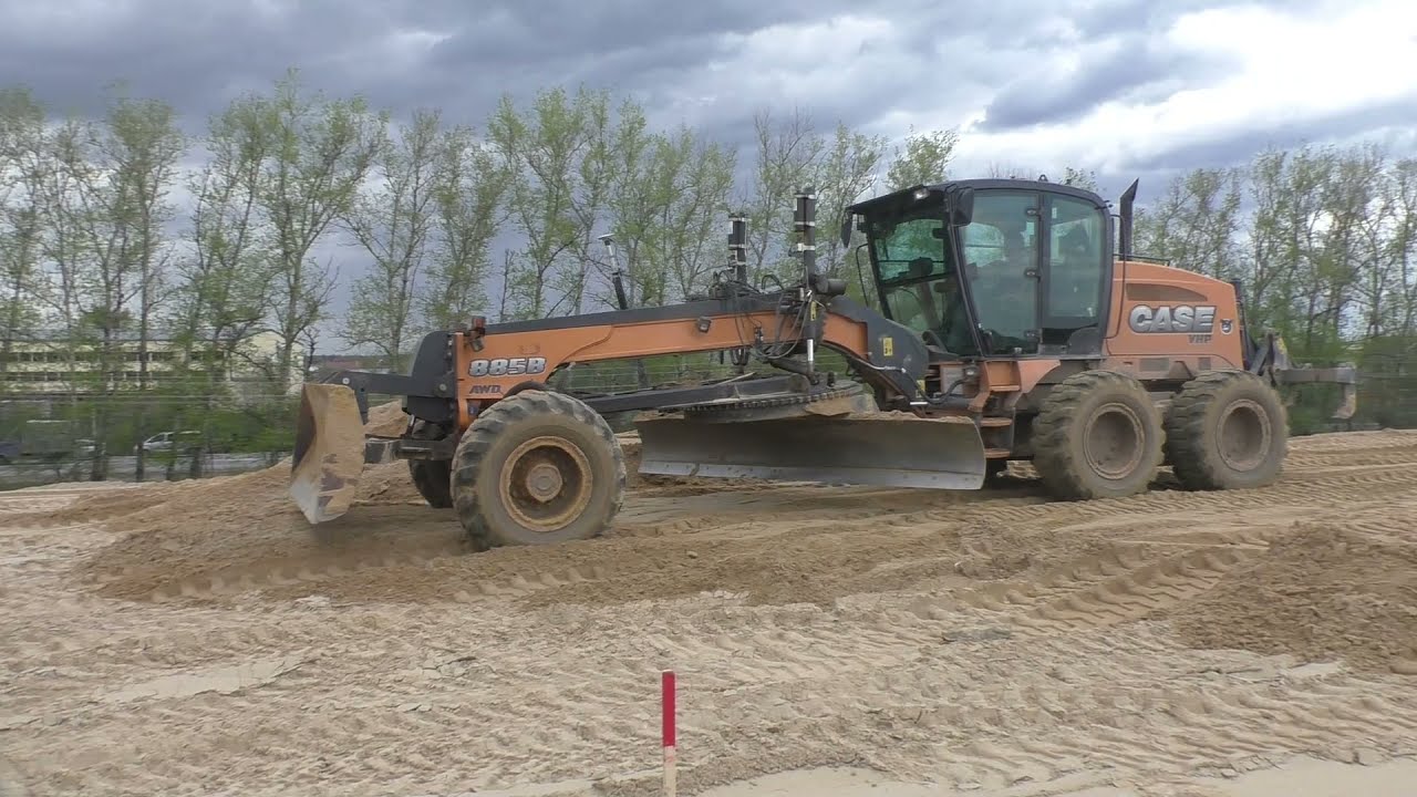 Case 885B grader spreading sand part 1