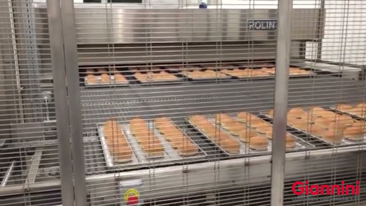 Scarico torre di lievitazione e carico forno a tunnel