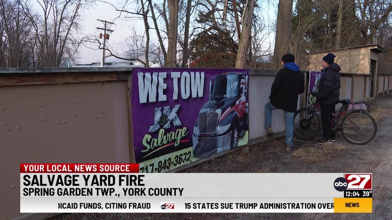 Crews remain on scene of salvage yard fire