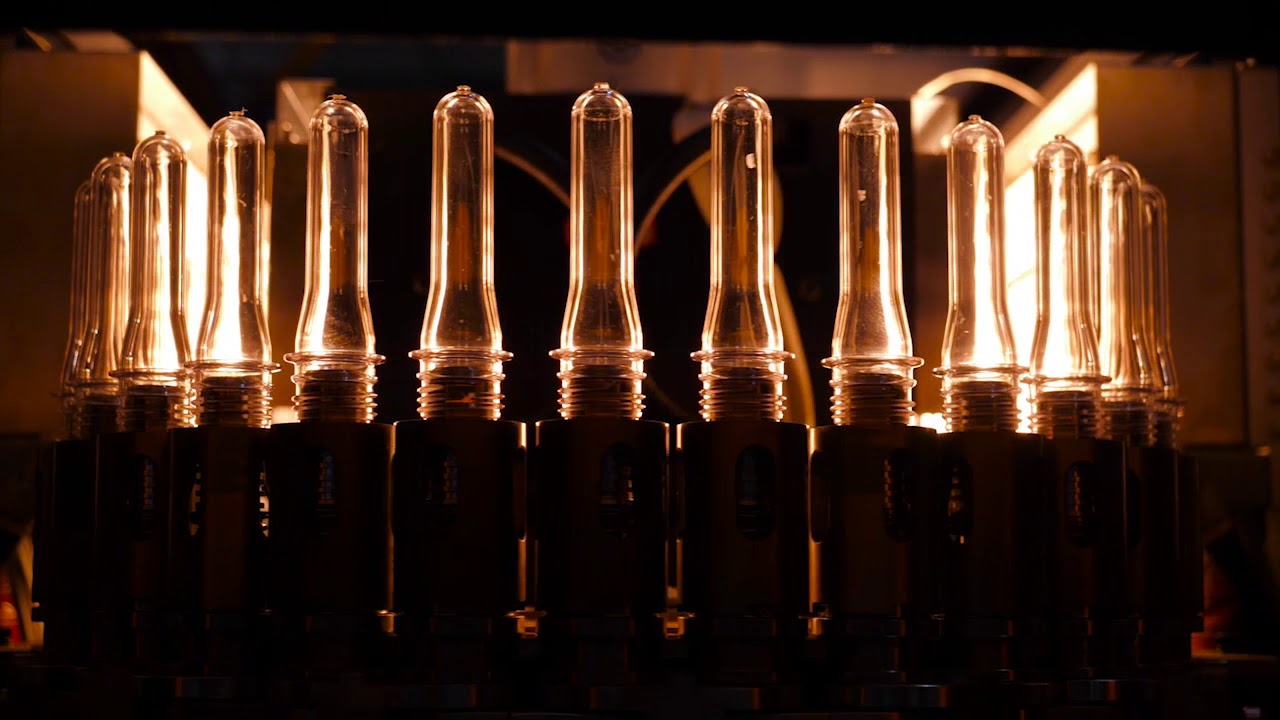 DMK-R Rotary Stretch Blow Molding Machine | High-Speed PET Bottle Production