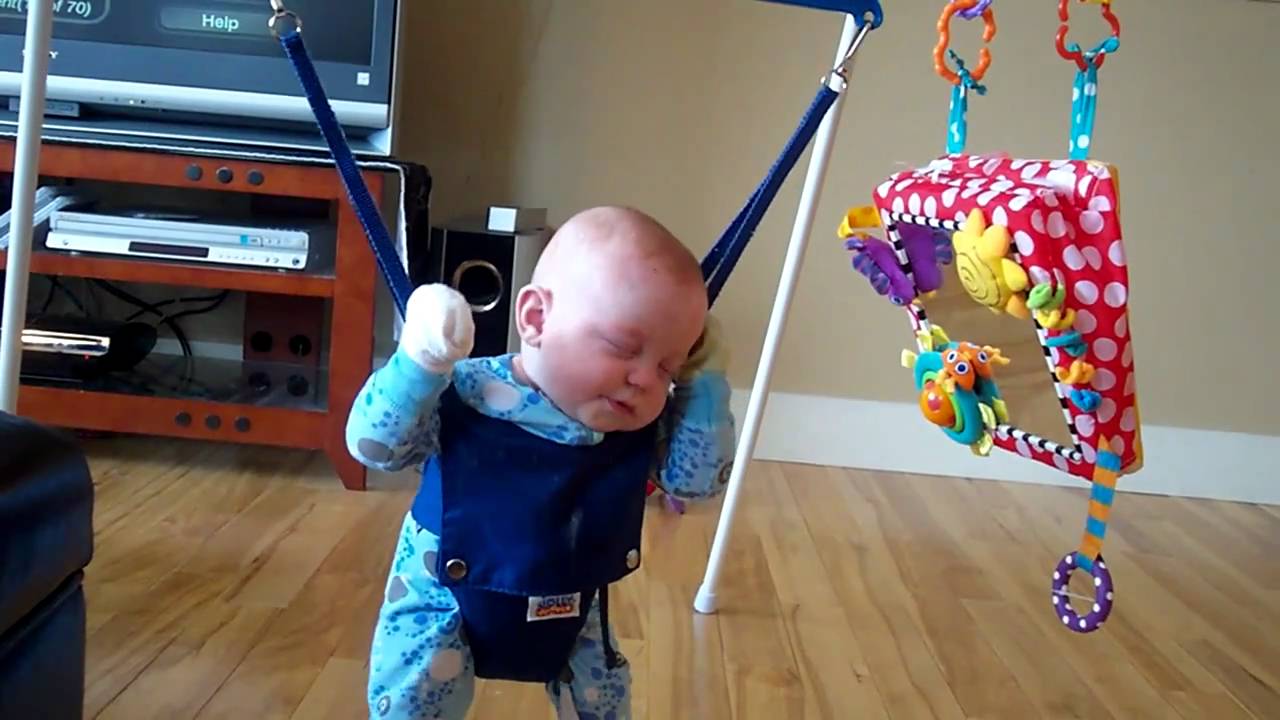 Baby falls asleep in Jolly Jumper