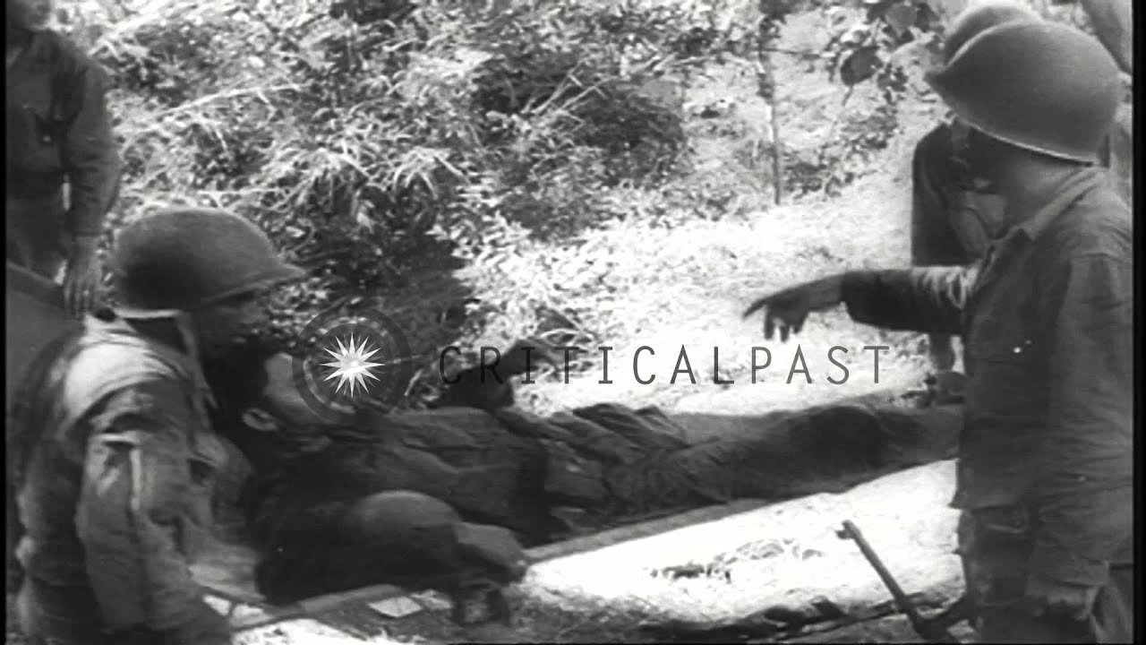 American Forces led by General MacArthur land at the Lingayen Gulf and advance to...HD Stock Footage