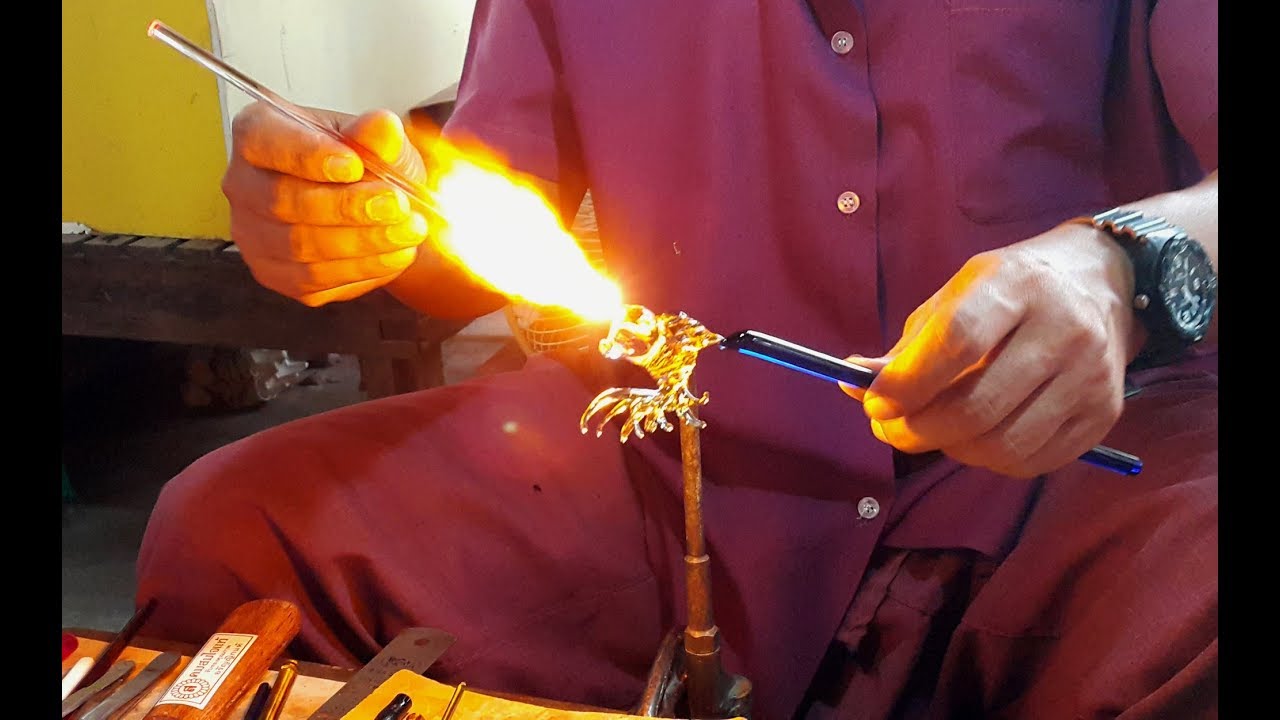 Handmade Art Blown Glass Collectible Figurine. unique by artisans working in an outdoor studio.