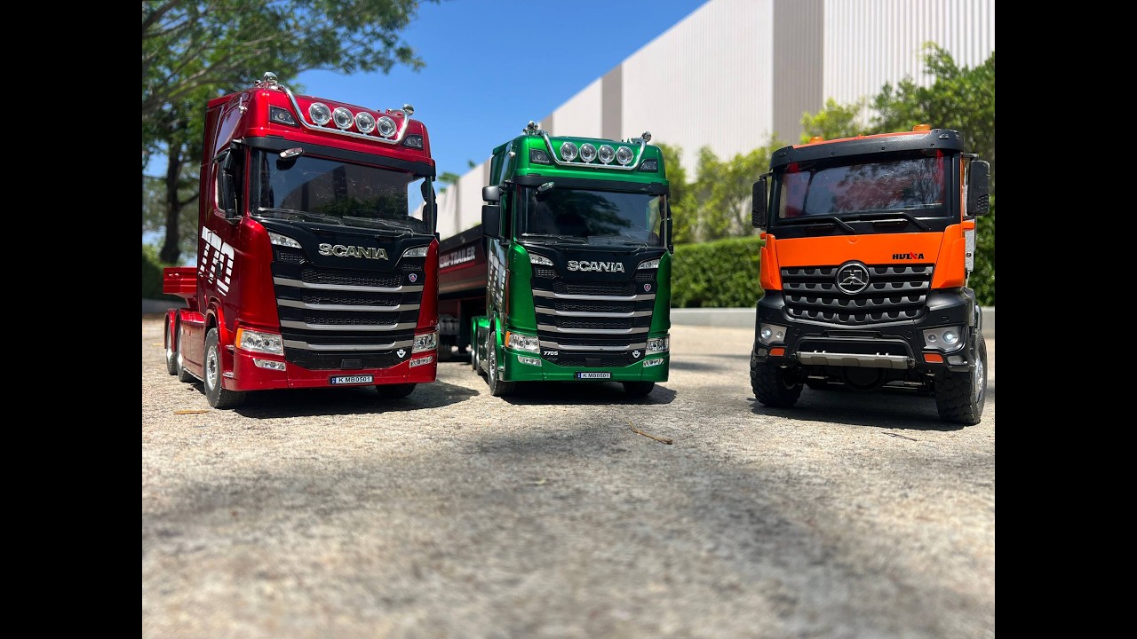 Three powerful machines are ready for the next mission. Red, green, and orange.