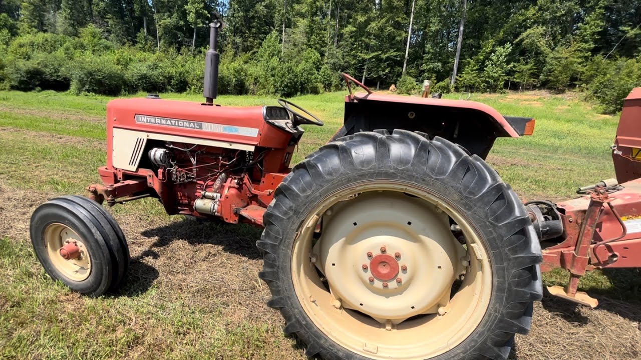 International 574 running a newholland 648