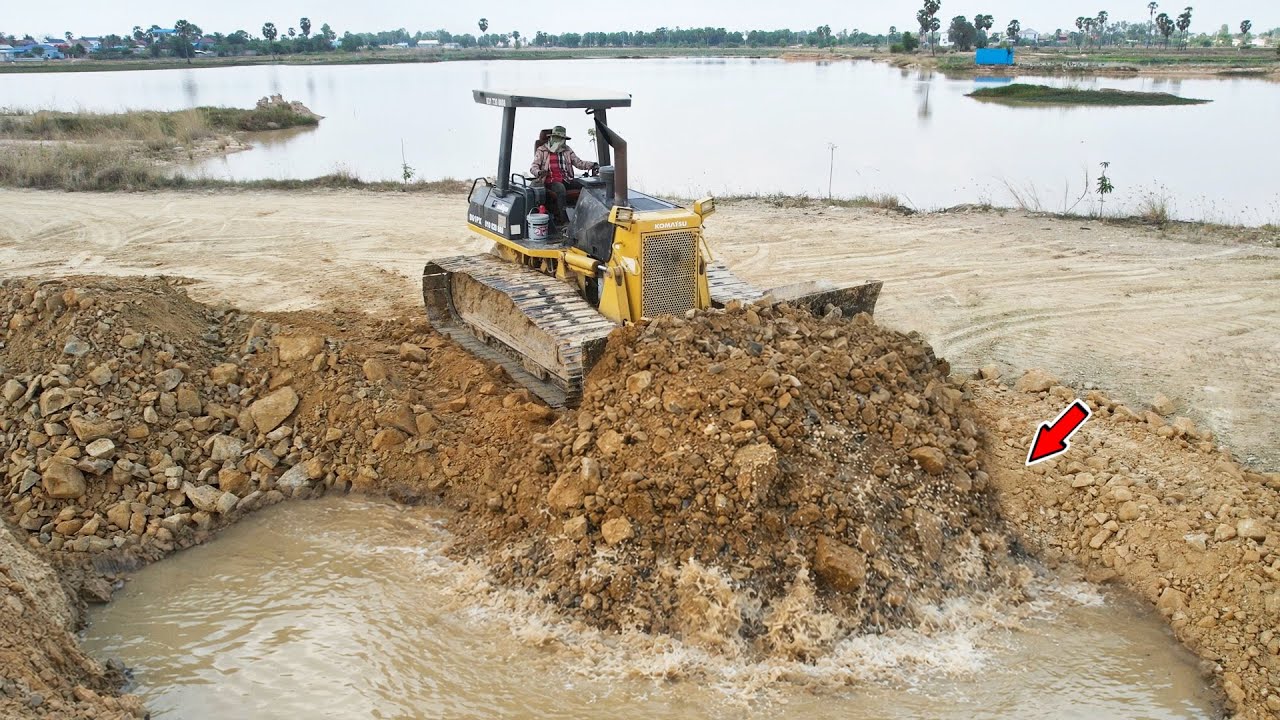 Nicely Lad Filling Construction Process Use Dozer Komatsu D61PX With Dump Truck Unloading