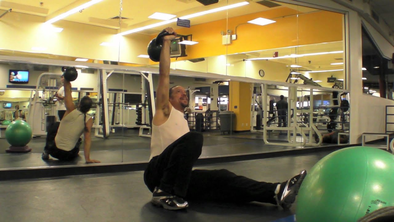 Turkish getup with 28kilos/ 61.7 pounds during chemotherapy Harlem Kettlebells