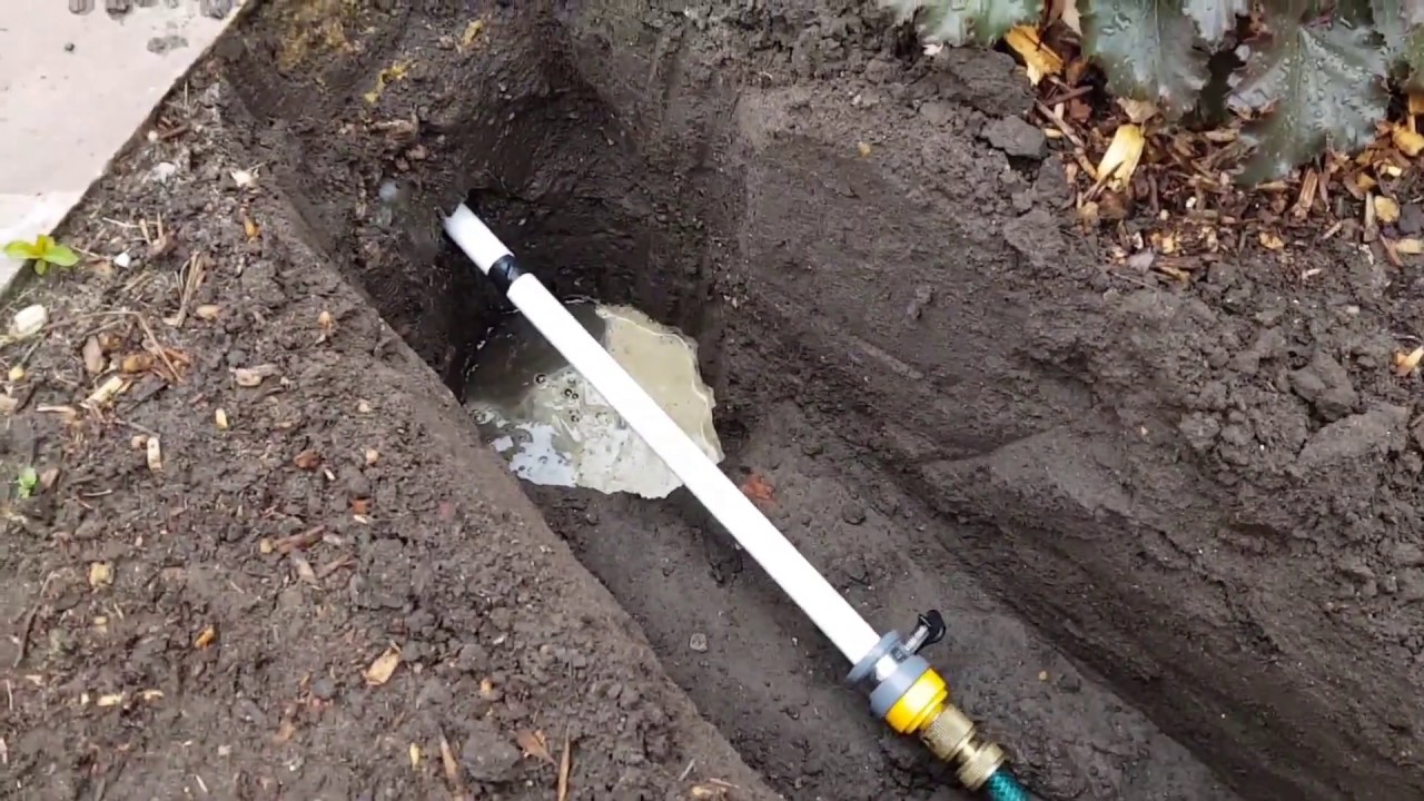 Watch me tunnel a hose under a patio. Learn from my mistakes as first I succeed and then fail.