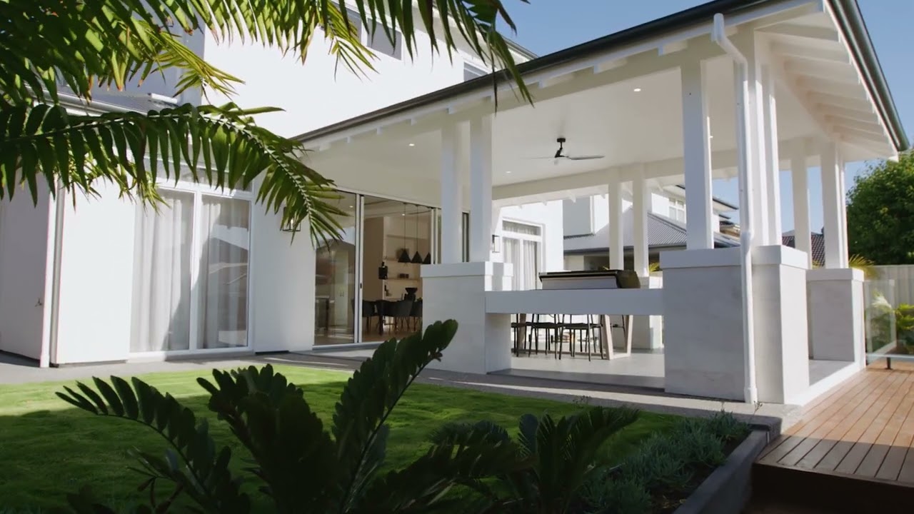 An individually crafted Hampton-style home