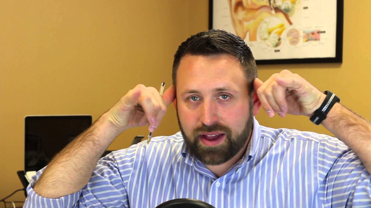 Can a hearing aid help me hear better in background noise?